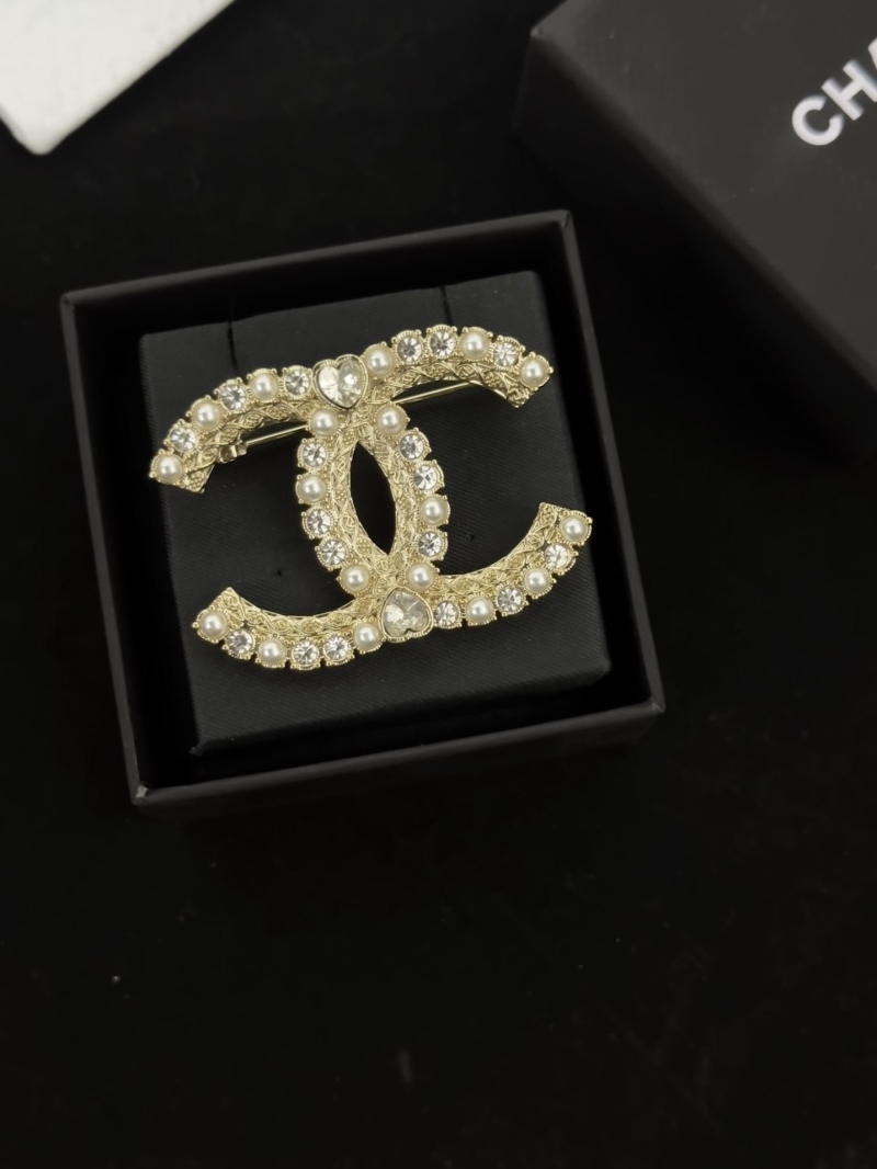 Ch**el brooches